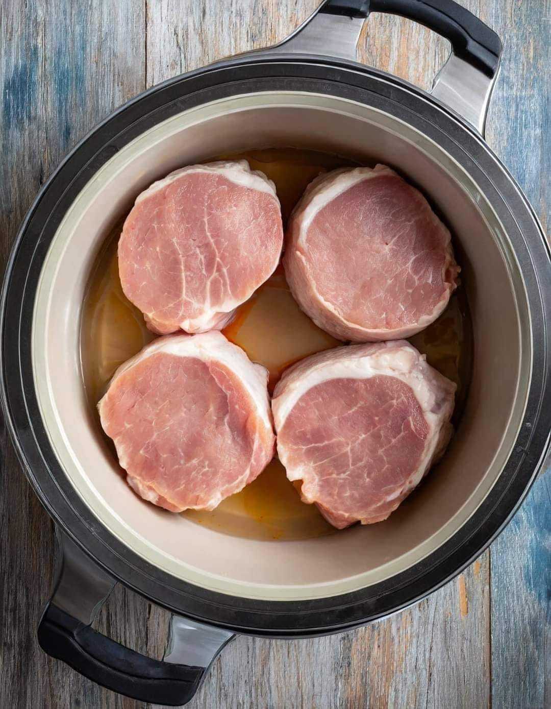 Put these 3 ingredients in a slow cooker for pork chops that melt in your mouth